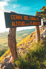 wooden sign on the beach
