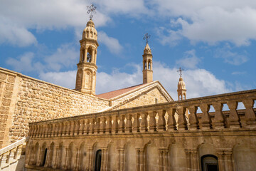 A majestic view of the historic Deyrulzafaran Monastery in Mardin, Turkey, showcasing its ancient...