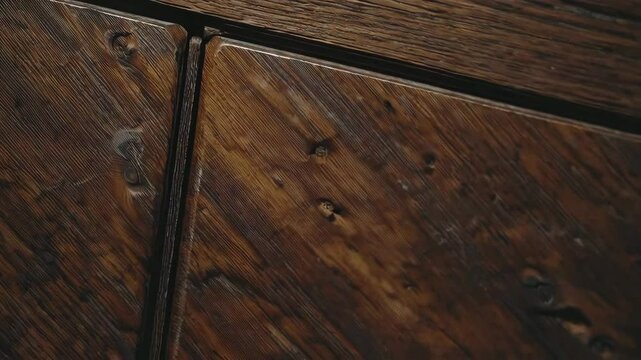 Closeup of rustic wooden texture with diagonal plank alignment and natural patterns