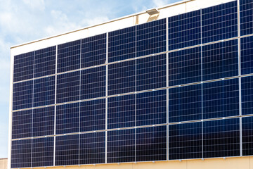Solar generation system on the building in sunny weather.