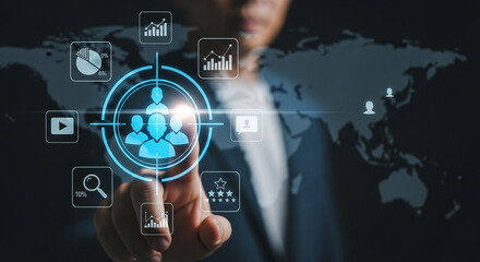 Businessman pointing at a digital interface showing customer targeting and business analytics on a world map
