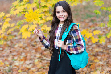 Back to school. Autumn girl with school bag. Education for adolescence. Teen girl in autumn park...
