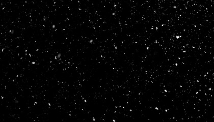 Obraz premium Snowflakes falling on a dark background