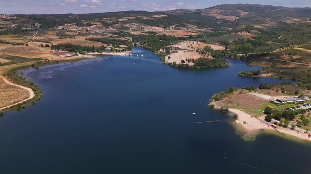 Aerial drone view of man made beaches at Albufeira do Azibo near Braganca, Portugal
