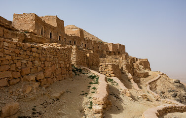 View of ruins mountain Berber village Guermassa, Tataouine, southeastern Tunisia