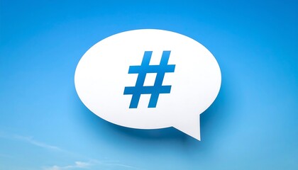 Obraz premium White speech bubble with blue hashtag symbol against a clear blue sky