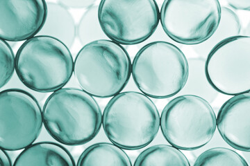 Beauty product moisture ingredient moisturizer, chlorophyll, peptides transparent spheres molecules 