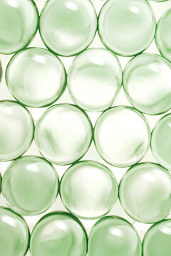 Beauty product moisture ingredient cica centella asiatica, aloe, pataua, canabis, chlorophyll, peptides transparent spheres molecules