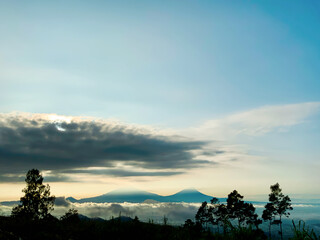 Silhouette of Merbabu and Merapi Mountains at Dawn
