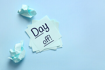 Sticky notes with question mark and crumpled paper balls on color background