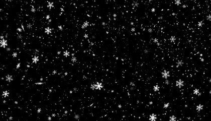 Snowflakes falling on black background