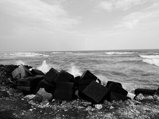 Deep black and white of waves crashing. Distrito Nacional, Santo Domingo, Dominican Republic