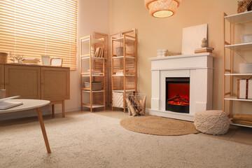 Interior of cozy living room with fireplace, firewood and shelving units