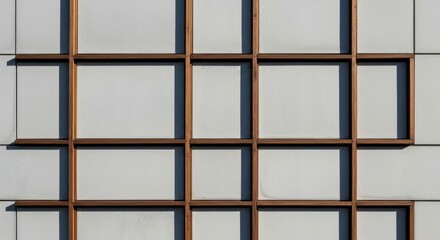 Modern Wall Facade: Geometric Wood Frames and Concrete Panels in Natural Light