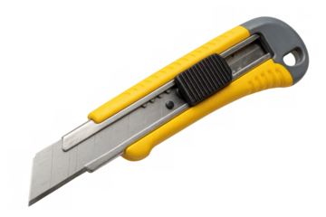 Yellow-grey utility knife with razor-sharp blade, positioned for precise cutting against transparent background