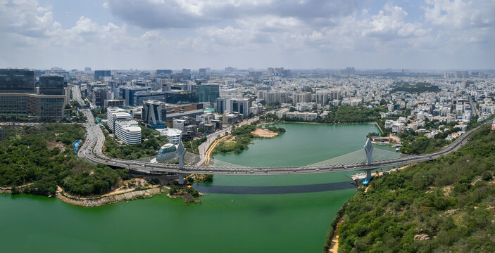 Aerial panoramic view of Hitec city at Durgam Cheruvu lake In Hyderabad, INDIA - Powered by Adobe