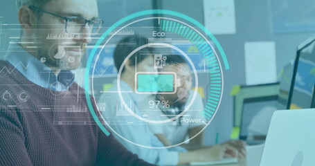 Typing senior data engineer working on laptop at tech workspace, with holographic data overlay