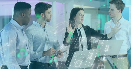 Gesturing woman in blazer presenting holographic code overlay in office, with laptop and smartphone