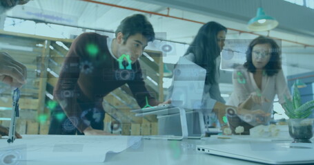 Discussing three professionals in business attire analyzing blueprint and digital overlay in office