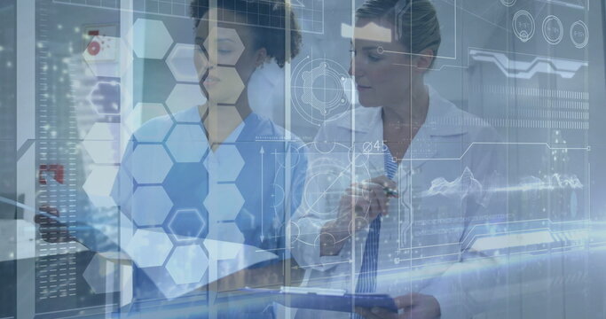 Doctor and nurse in medical attire reviewing records in clinic, with clipboard, holographic overlay