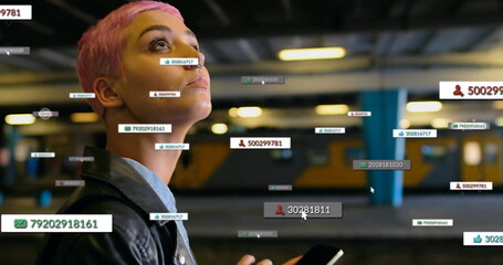 Holding smartphone, woman wearing leather jacket scanning ID overlays at train station, copy space