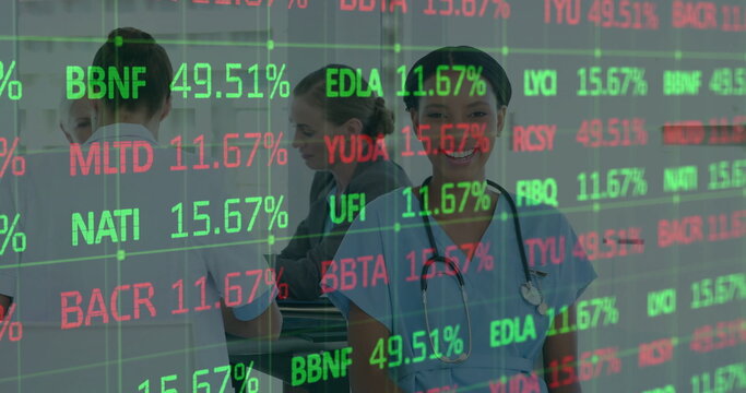 Nurse with stethoscope reviewing overlay codes and percentages at curved nurse station, copy space