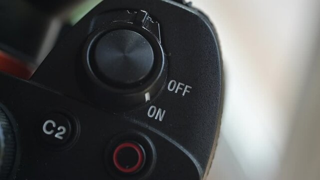 Close up of photo video camera in action