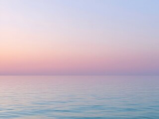 Obraz premium Calm pastel pink and blue horizon over a smooth sea during sunset, creating a serene and minimalistic atmosphere perfect for backgrounds, wellness, relaxation, and nature-themed designs