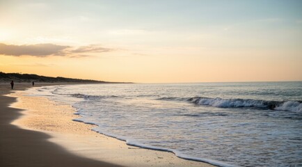 Fototapeta premium Tranquil beach scene at sunset with gentle waves and soft light