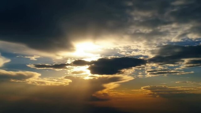 Timelapse of sunset skies moving over the horizon. Late sun and sunflares