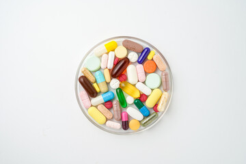 Clock made of pills capsules, pills form a circle, omega, vitamins, Cod liver oil, supplements