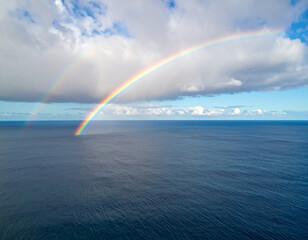 Rainbow Over Ocean from Drone: Aerial View of Sea & Horizon, Beautiful Natural Phenomenon & Coastal Landscape, Hope & Serenity

