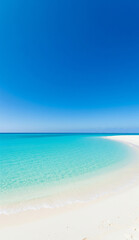 Fototapeta premium Unspoiled tropical beach with shallow surf and blue skies