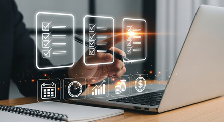 Using a computer for organizing family business finances, a man manages documents, tracks income and expenses.