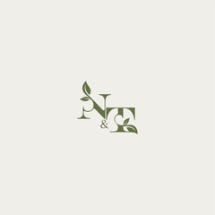 bold initial concept luxury wedding monogram design NT organic leaf logo letter