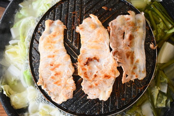 pork barbecue on frying pan, Thai style cuisine