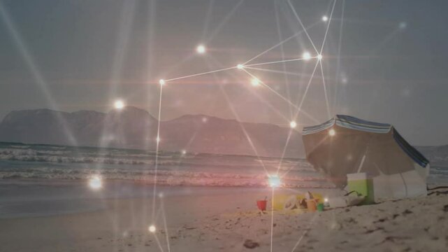 Glowing network overlay pulsing and drifting then fading to reveal striped umbrella and toys