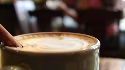 Cinnamon Latte with Cafe, and Coffee Art. - Powered by Adobe