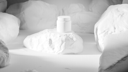 Minimalist black beauty container mockup displayed on a rugged rock podium with dramatic lighting. Ideal for skincare, cosmetics, or branding presentations. Premium photo 3d render.