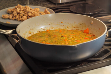 Close-Up of Homemade Chicken Pot Pie Being Prepared with Simple Ingredients