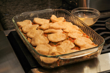 Close-Up of Homemade Chicken Pot Pie Being Prepared with Simple Ingredients