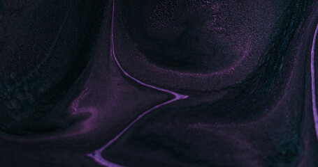 Paint splash. Chemical texture. Defocused purple color flowing pigment liquid emulsion floating on...