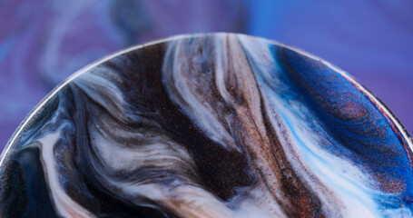 Flowing ink. Particles fluid. Defocused bronze blue purple color wet bubble shiny texture floating...