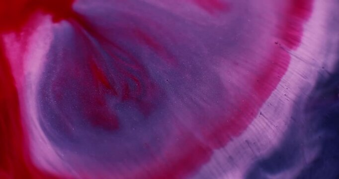 Liquid marble texture. Ripple fluid. Blur blue purple crimson color ink in acrylic water red drip spilling on abstract background.