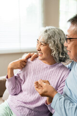 Happy senior couple hugging, bonding, thinking of good future. Carefree cheerful old husband...