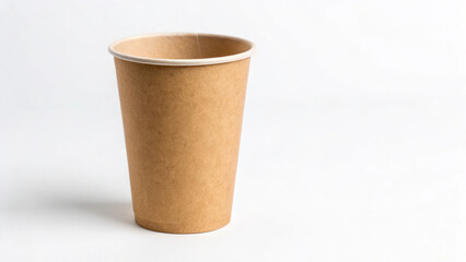 Minimalist kraft paper coffee cup standing on a clean white background. 