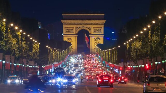 PARIS - MAY 2015: Traffic on Champs Elysees at night