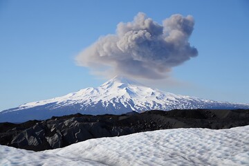 A breathtaking panorama of snow-covered mountains under a vast winter sky
