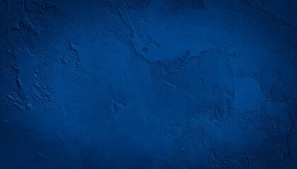 Deep blue textured wall with visible brushstrokes and subtle shadows