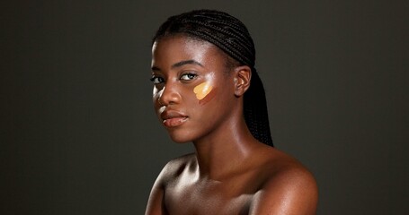 Black woman, portrait and makeup with shade in studio for beauty or foundation on a dark background. Female person, African model or color stripes with cosmetics for skin tone correction on space